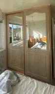 Wrapped split Victoria doors with mirrors in copper frames, fitted in Billingham